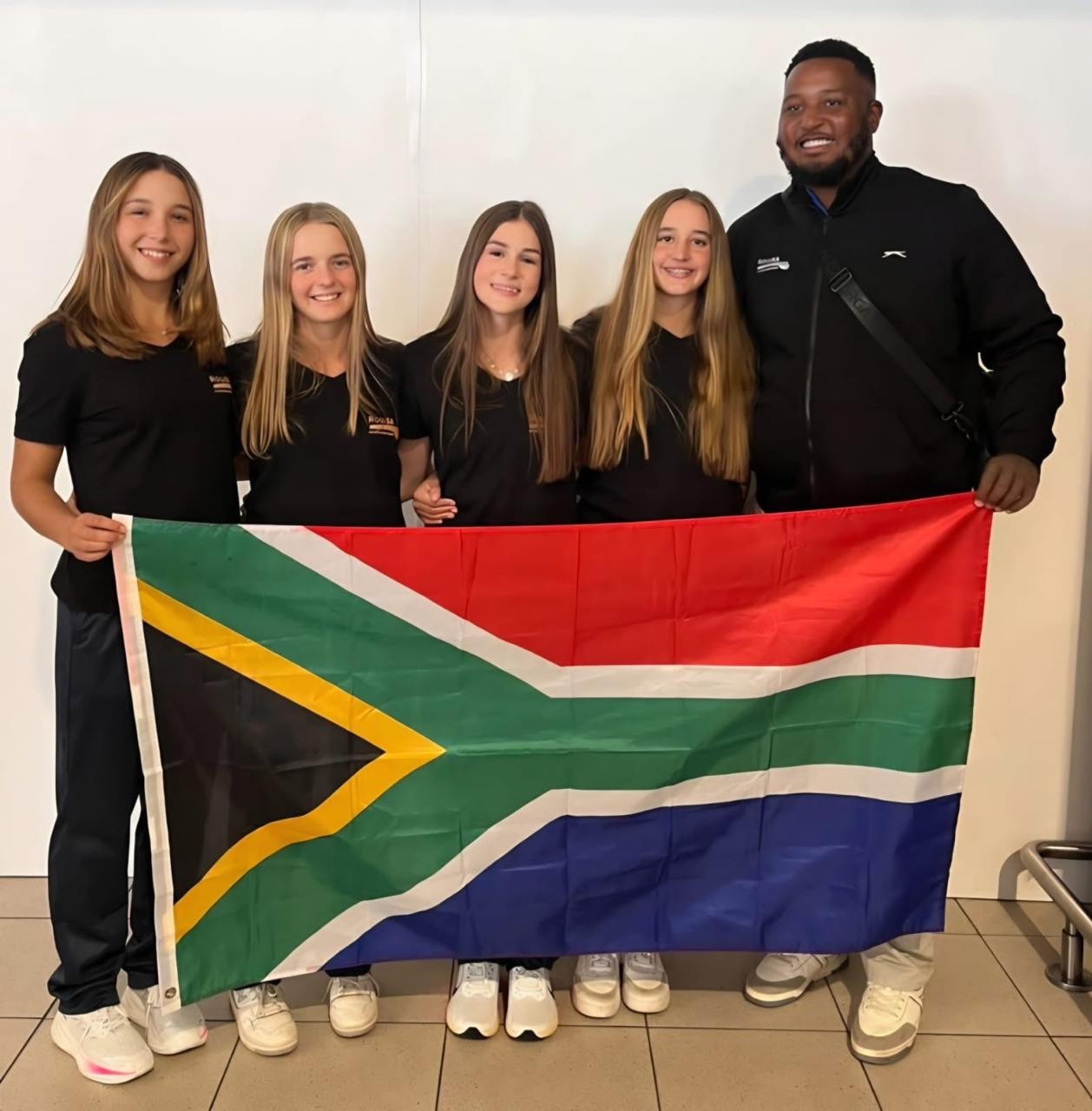 Holy Rosary Team and Coach from Left - Kate Zillen, Emilia Riccardi, Erin Beeming, Cleo De Keizer and Thabelo Masutha