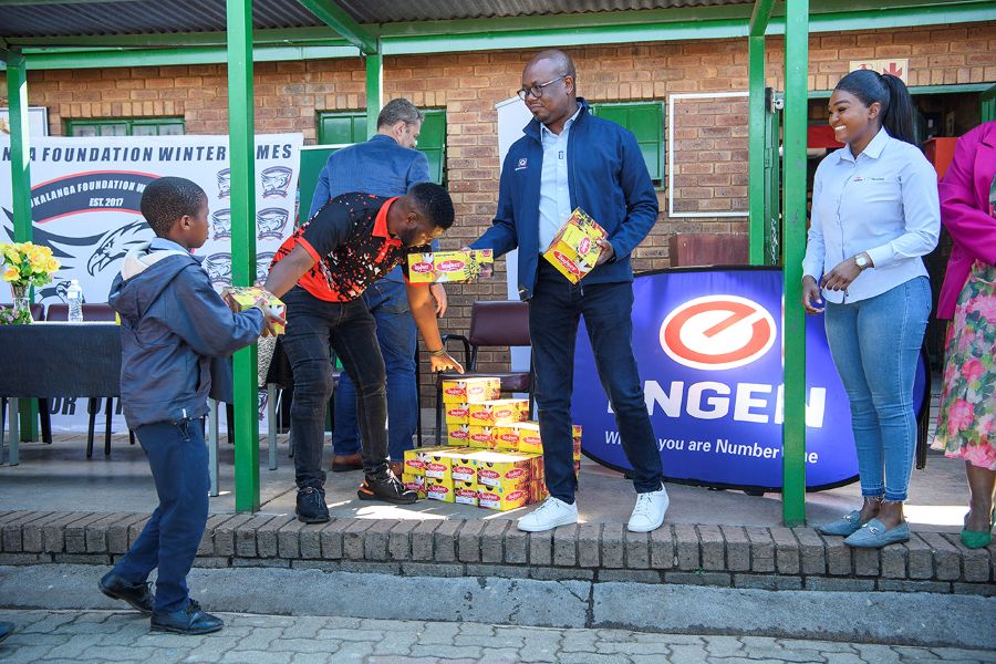 Engen Thorntree ZZ Convenience Centre supports Siqobile Primary School with 100 pairs of school shoes. Image supplied by PR company.